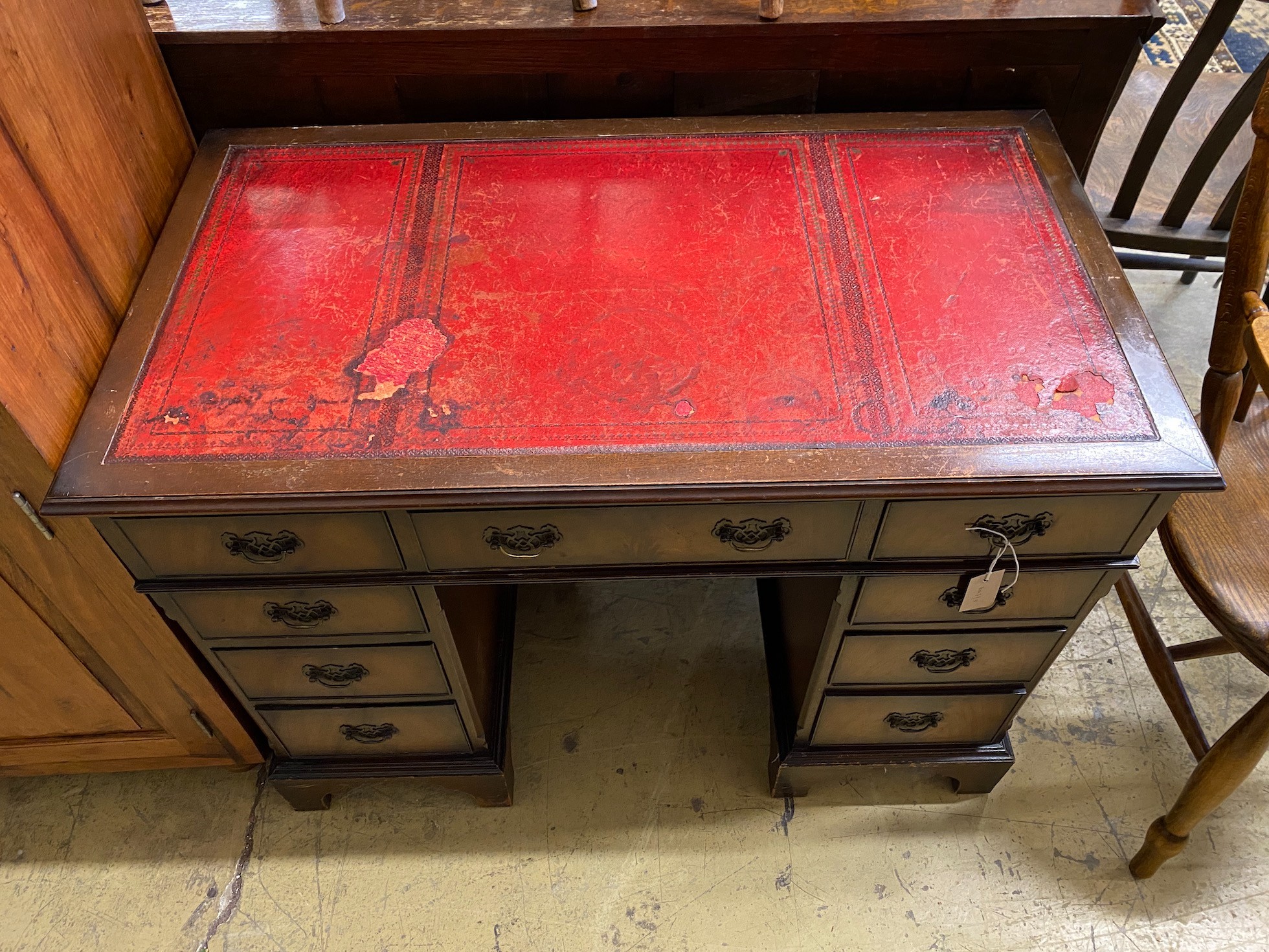 A reproduction mahogany pedestal desk, width 100cm, depth 56cm, height 76cm